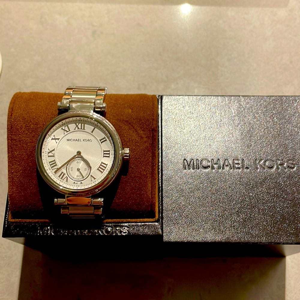 Mickael Kors silver watch with crystal rim